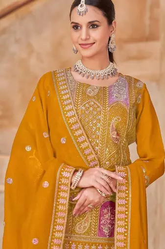 Mustard vichitra silk readymade suit with embroidered lace 