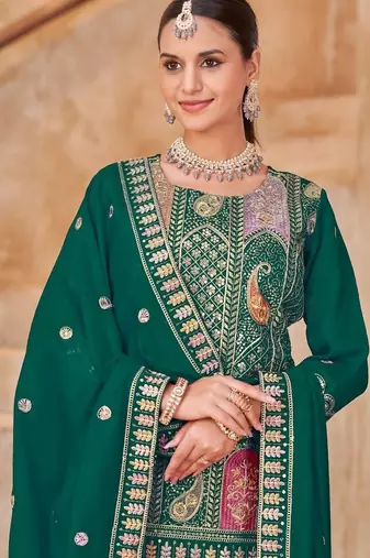 Green vichitra silk readymade suit with embroidered lace 