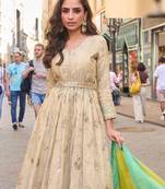 Light green simmar silk anarkali with thread & sequin work small motifs and detailed border.