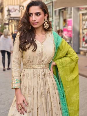 Light green simmar silk anarkali with thread & sequin work small motifs and detailed border. 2