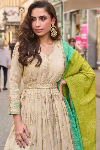 Light green simmar silk anarkali with thread & sequin work small motifs and detailed border.