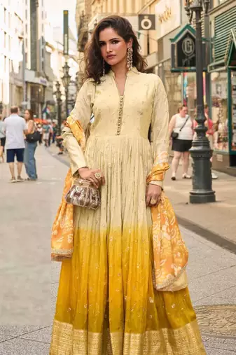 Mustard yellow simmar silk anarkali with thread & sequin work small motifs and detailed border.
