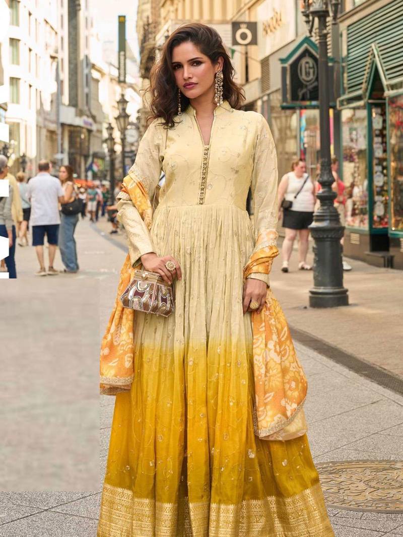 Mustard yellow simmar silk anarkali with thread & sequin work small motifs and detailed border.