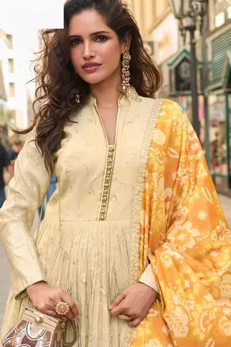 Mustard yellow simmar silk anarkali with thread & sequin work small motifs and detailed border.