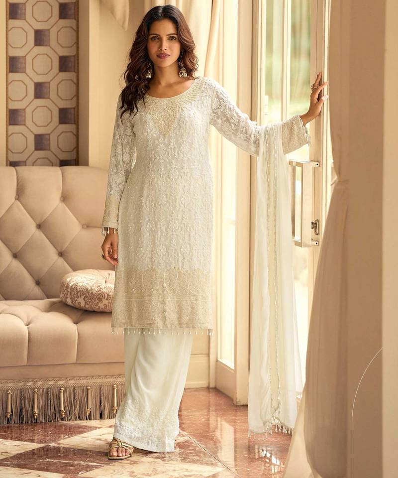 Off-white georgette set with white thread zari & sequin work plus embroidered borders and sleeves 42")