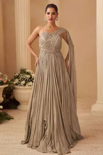 Beige chinnon silk cape anarkali with golden zari thread floral embroidery and sequin edges-Full Stitched free size