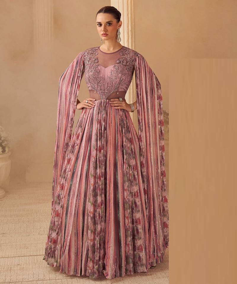 Dusty pink chinnon silk cape anarkali with golden zari thread floral embroidery and sequin detailing.