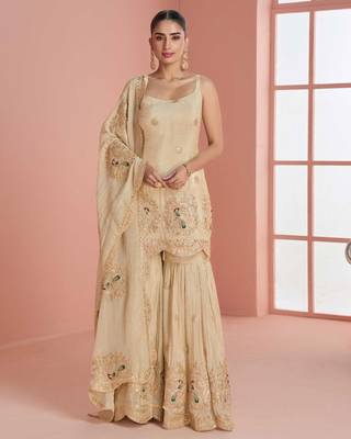 Light yellow chinnon silk straight top palazzo with zari, thread, motif and sequin work plus border. 1