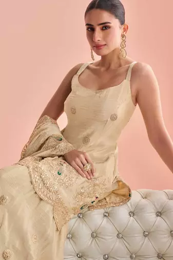 Light yellow chinnon silk straight top palazzo with zari, thread, motif and sequin work plus border.