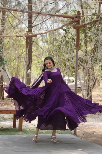 Purple color embroidered georgette gown with dupatta