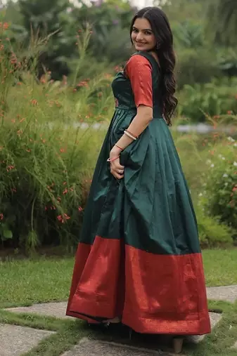 Green color banarasi jacquard weaving gown