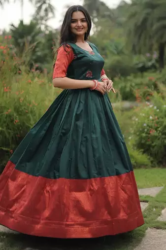 Green color banarasi jacquard weaving gown