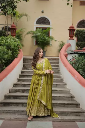 Pista green color sequins embroidered chinnon gown sharara with dupatta