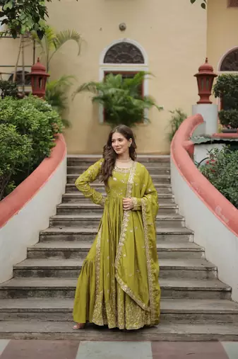 Pista green color sequins embroidered chinnon gown sharara with dupatta