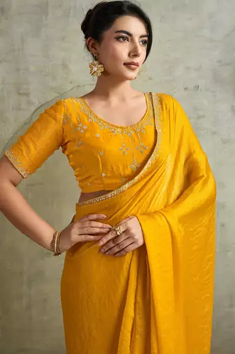Graceful Yellow Chiffon Haldi Wear Saree With Diamond Work Blouse