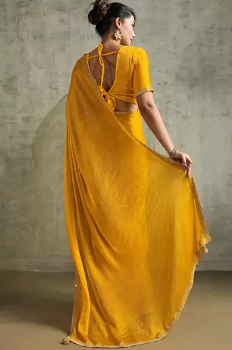 Graceful Yellow Chiffon Haldi Wear Saree With Diamond Work Blouse