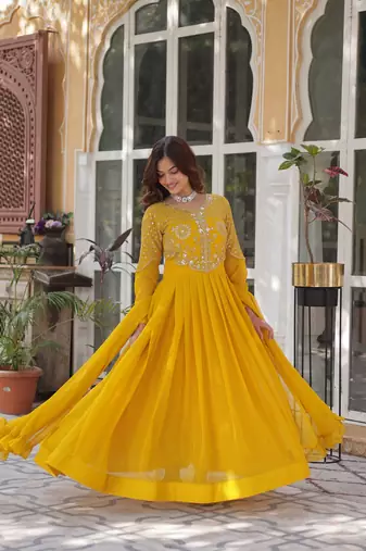 Yellow color embroidered work georgette gown with dupatta