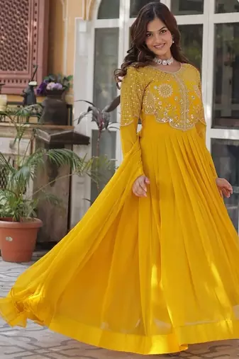 Yellow color embroidered work georgette gown with dupatta