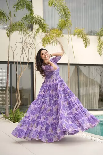 Purple color faux georgette printed flair gown