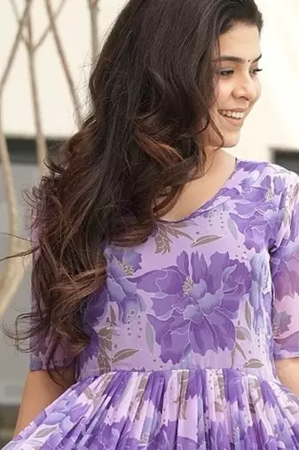 Purple color faux georgette printed flair gown