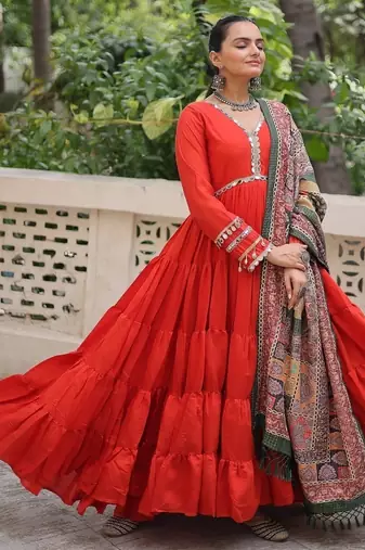 Orange color roman silk blend mirror lace work gown with printed dupatta