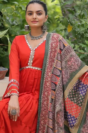 Orange color roman silk blend mirror lace work gown with printed dupatta