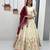 Cream Heavy Work Lehenga Choli with Grand Maroon Dupatta and 4-Side Lace Cutwork