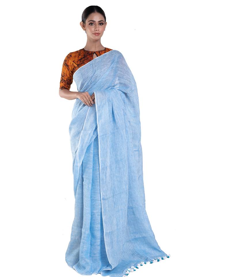 baby blue handloom linen saree with zari border and pallu