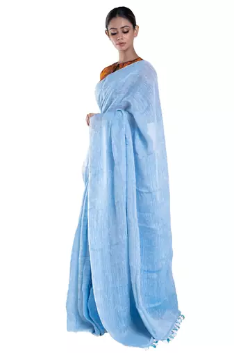 baby blue handloom linen saree with zari border and pallu