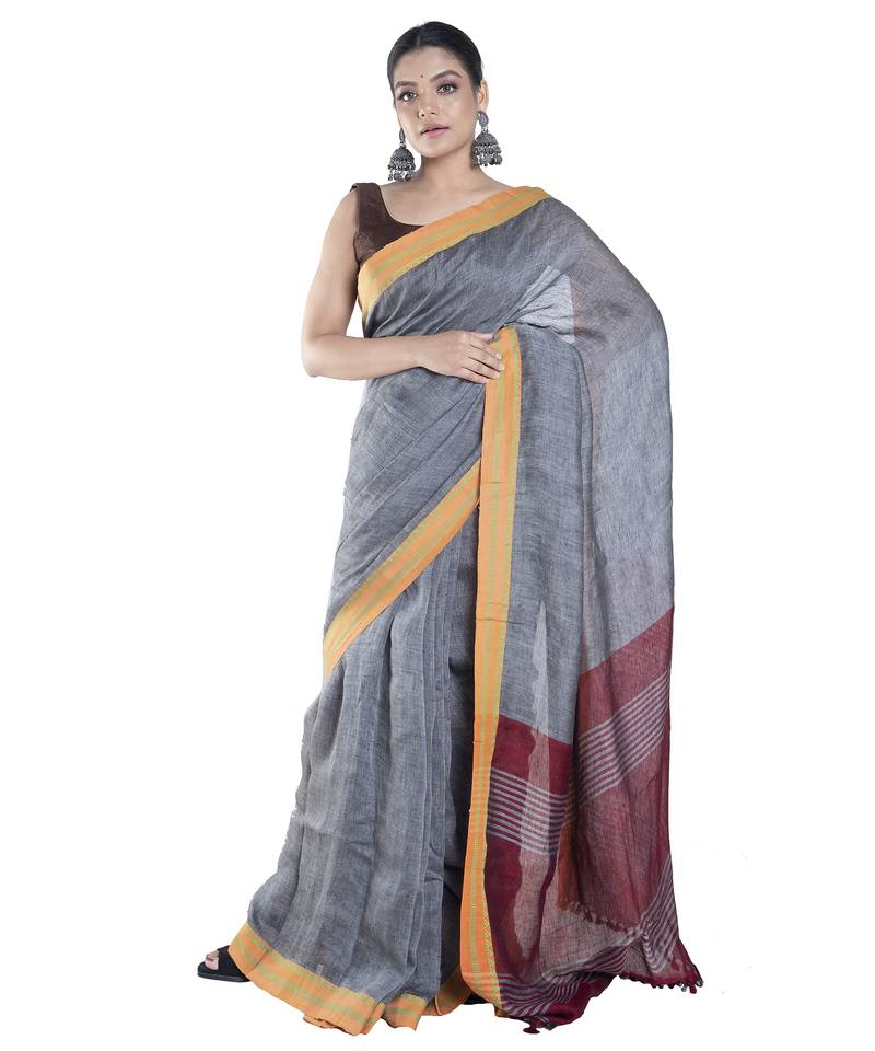 dusky grey handloom linen saree with contrasting border and pallu