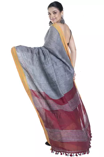 dusky grey handloom linen saree with contrasting border and pallu