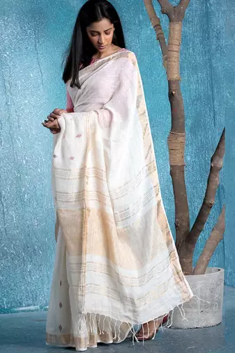 ivory handloom linen saree with magenta booti and golden border