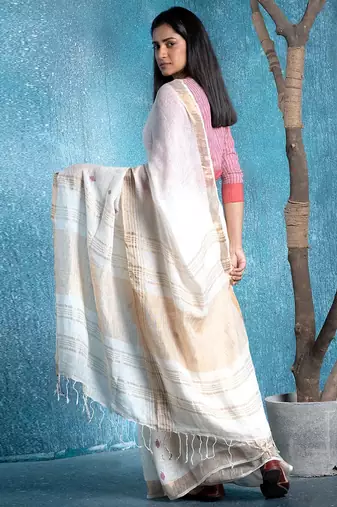 ivory handloom linen saree with magenta booti and golden border