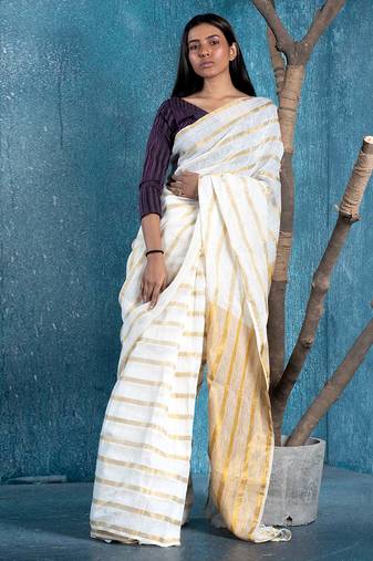 white and gold handloom linen saree