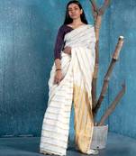 white and gold handloom linen saree