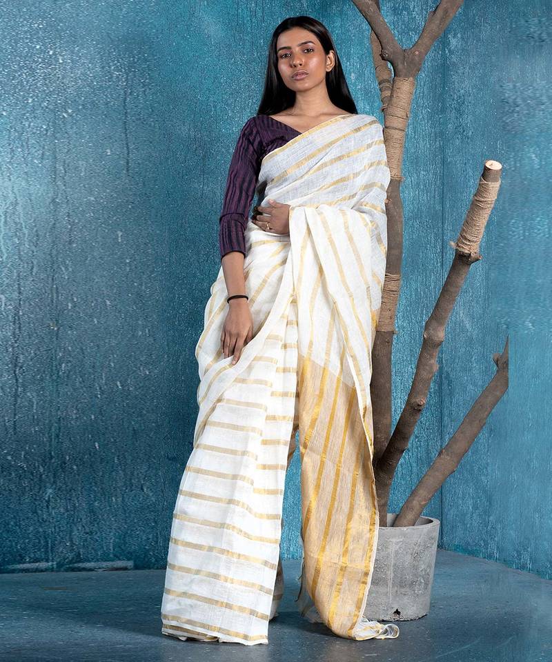white and gold handloom linen saree