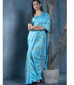 blue blended linen saree with green color floral embroidery