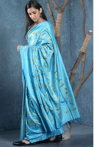 blue blended linen saree with green color floral embroidery