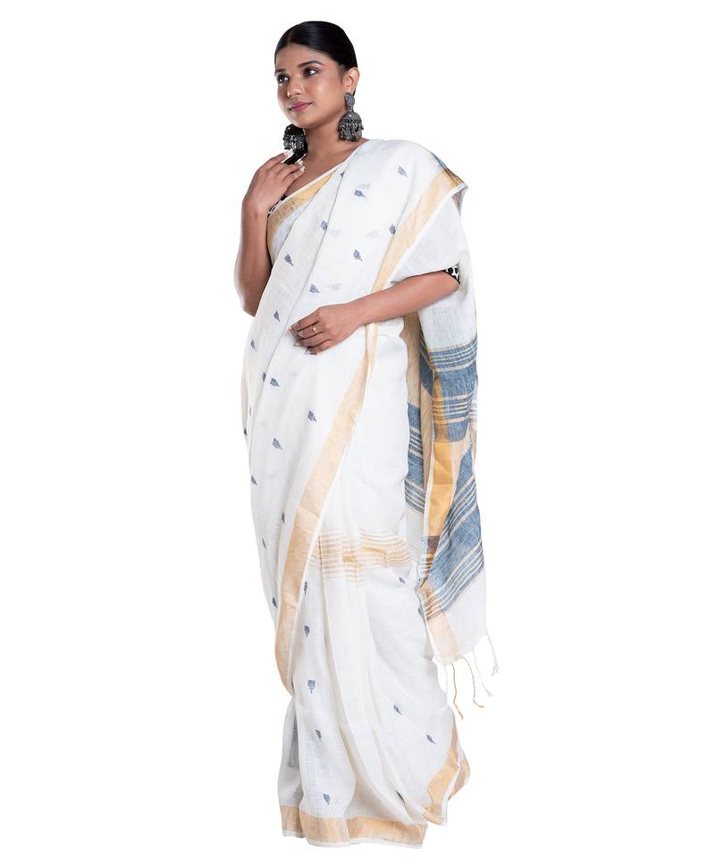 ivory handloom linen saree with blue booti and golden border