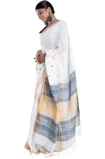 ivory handloom linen saree with blue booti and golden border