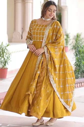 Stunning Mustard Sequins Silk Festival Wear Gown With Dupatta