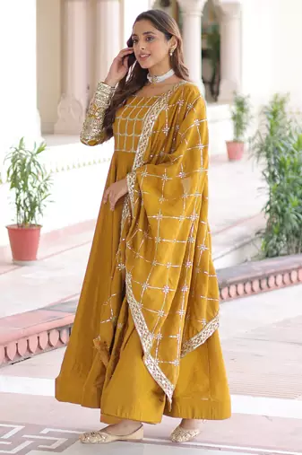 Stunning Mustard Sequins Silk Festival Wear Gown With Dupatta
