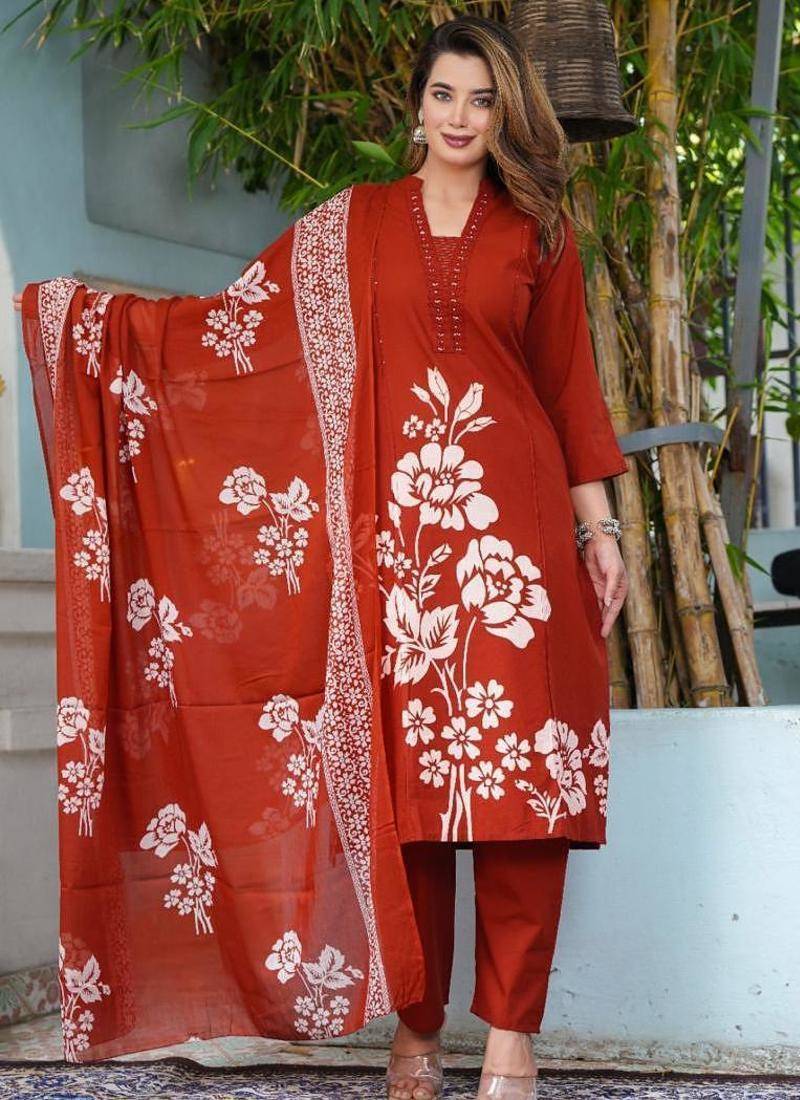 Beautiful jaipuri rust orange cotton straight-fit kurta set with a white floral print.