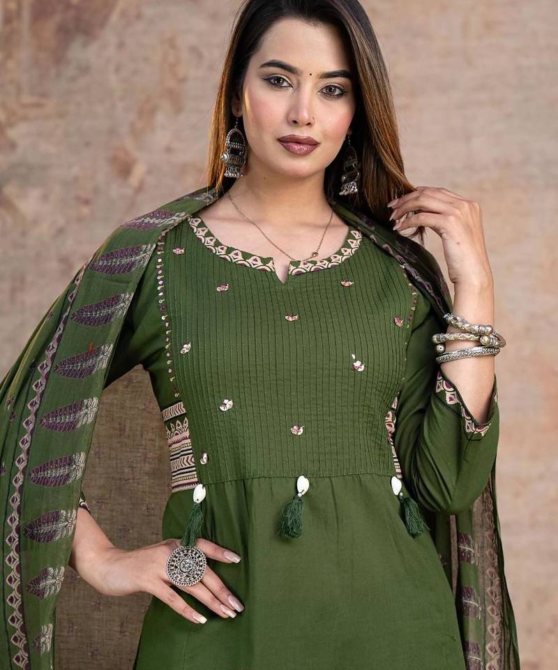 Beautiful jaipuri a green embroidered kurta suit set with a matching dupatta and trousers.