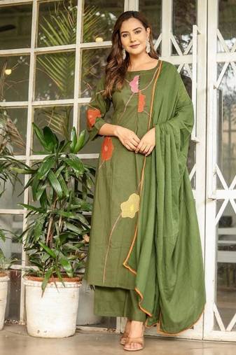 Beautiful jaipuri a green cotton kurta, pant, and dupatta set with floral applique designs and orange piping.
