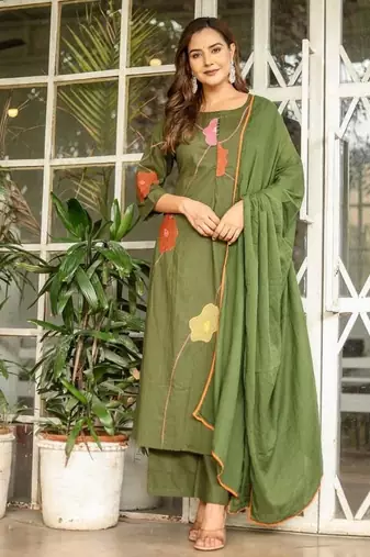 Beautiful jaipuri a green cotton kurta, pant, and dupatta set with floral applique designs and orange piping.