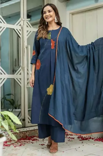 Beautiful jaipuri a navy blue cotton kurta, pant, and dupatta set with floral applique designs and orange piping.