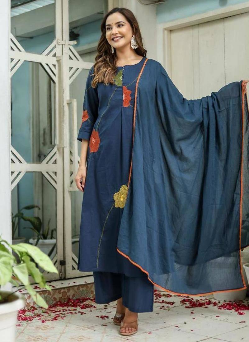 Beautiful jaipuri a navy blue cotton kurta, pant, and dupatta set with floral applique designs and orange piping.