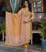 Beautiful jaipuri a yellow and white printed indian kurta set with a matching dupatta and pants.