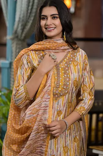 Beautiful jaipuri a yellow and white printed indian kurta set with a matching dupatta and pants